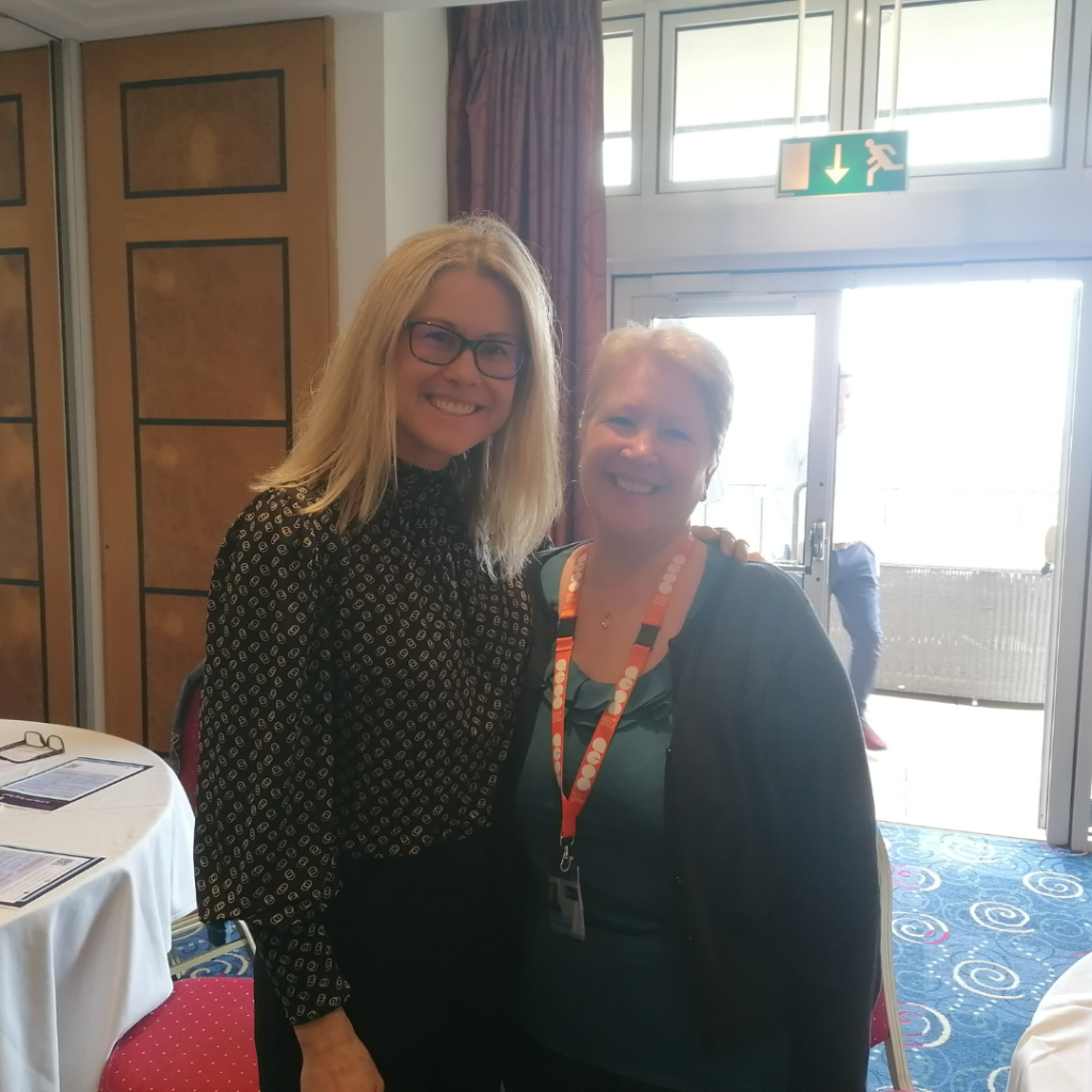 Helen Brewis poses for a photo with a Brownbill case manager on the study day.